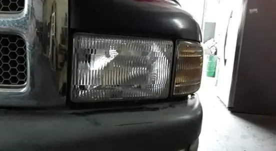 Clear headlight on a truck after restoration