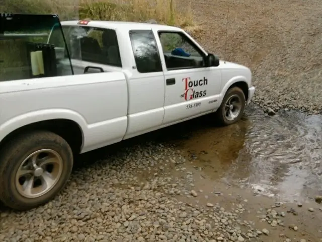 Company pickup with the Touch of Glass door decal